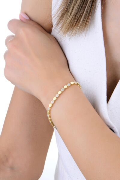 Gümüş altın yaldızlı zirkon taşlı oval şekilli zamansız zerafet bileklik SGTL12894GOLD