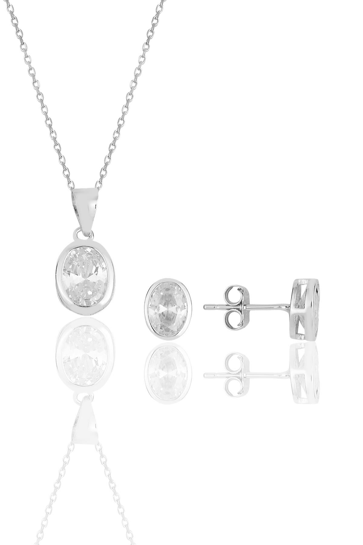 Gümüş rodyumlu oval kesim zirkon taşlı kolye kupe ikili set.. SGTL11618OVAL