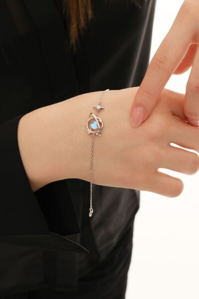 Gümüş rodyumlu ay taşı ve zirkon taşlı uzayın büyüsü gezegen bileklik SGTL12639RODAJ