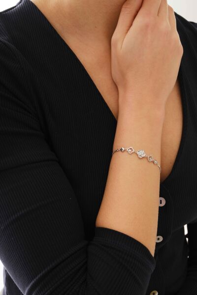 Gümüş rodyumlu sedef ve zirkon taşlı gizemli yonca bileklik SGTL12645RODAJ