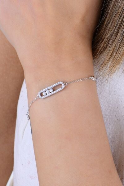 Gümüş rodyumlu hareketli zirkon taşlı umut ışığı kapsül bileklik SGTL12932RODAJ