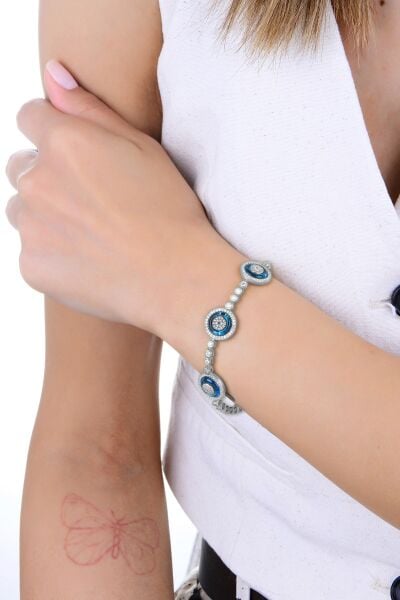 Gümüş rodyumlu zirkon taşlı üç  nazar boncuklu cam göz su yolu bileklik SGTL12945RODAJ