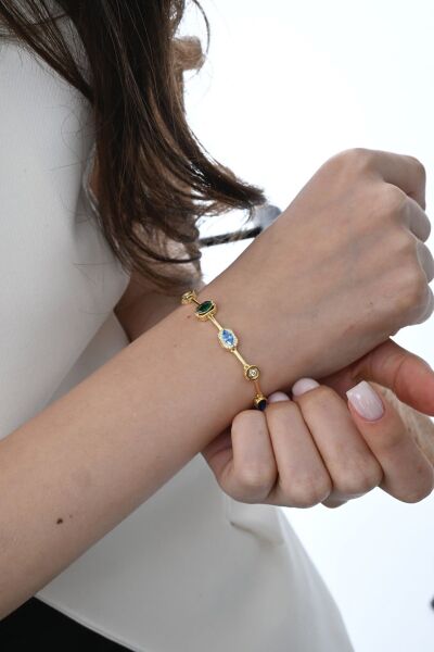 Gümüş altın yaldızlı asimetrik kesim renkli zirkon taşlı bileklik  SGTL12865GOLD