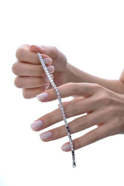 Gümüş rodyumlu zirkon taşlı modern görünümlü çiçek zinciri bileklik SGTL12850RODAJ