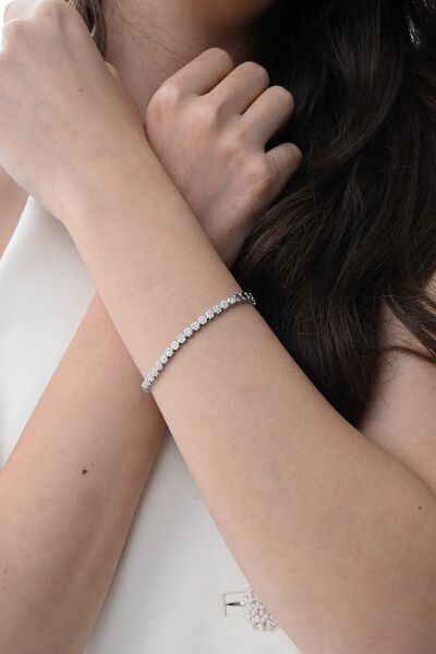 Gümüş rodyumlu zirkon taşlı modern görünümlü çiçek zinciri bileklik SGTL12850RODAJ