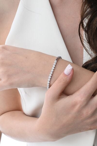 Gümüş rodyumlu zirkon taşlı modern görünümlü çiçek zinciri bileklik SGTL12850RODAJ