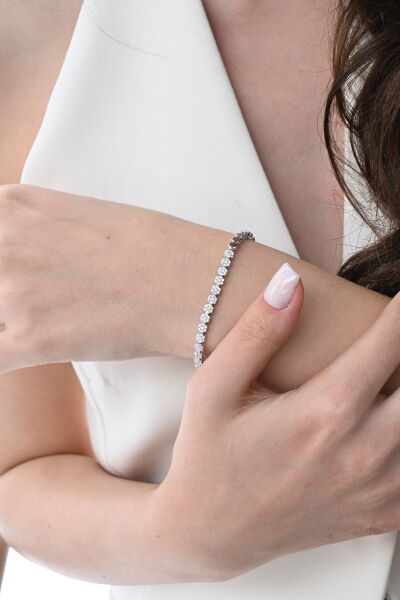 Gümüş rodyumlu zirkon taşlı modern görünümlü çiçek zinciri bileklik SGTL12850RODAJ