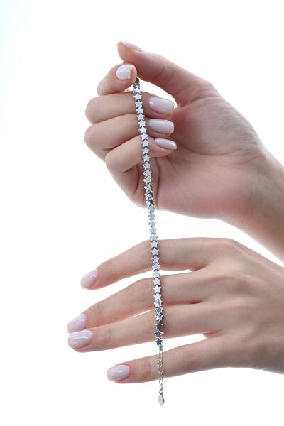 Gümüş rodyumlu modern görünümlü kayan yıldızlar bileklik SGTL12856RODAJ