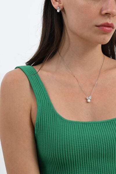 Gümüş rodyumlu zirkon taşlı yaprak modeli kolye ve küpeden oluşan ikili incili set  SGTL13035RODAJ