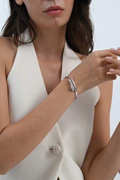 925 ayar gümüş rodyumlu gözü yeşil zirkon taşlı yılan modeli bilezik SGTL13044RODAJ