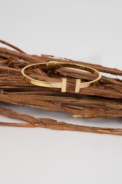 925 ayar gümüş altın yaldızlı zirkon taşlı T model bilezik SGTL13045GOLD