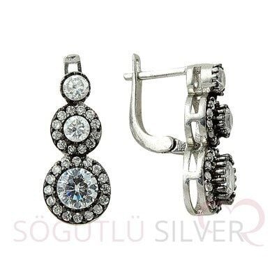 Tria  rodyumlu elmas montürlü küpe küpe8545