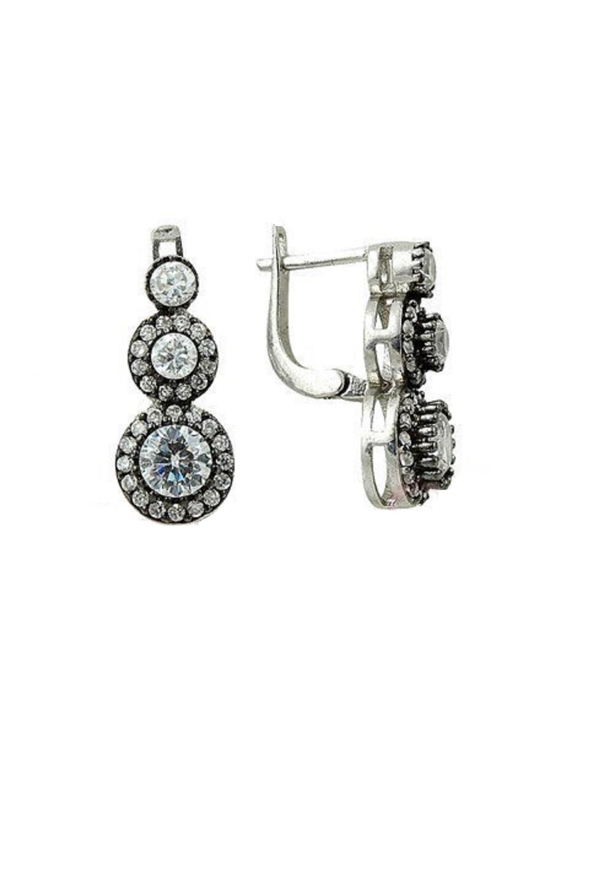 Tria  rodyumlu elmas montürlü küpe küpe8545